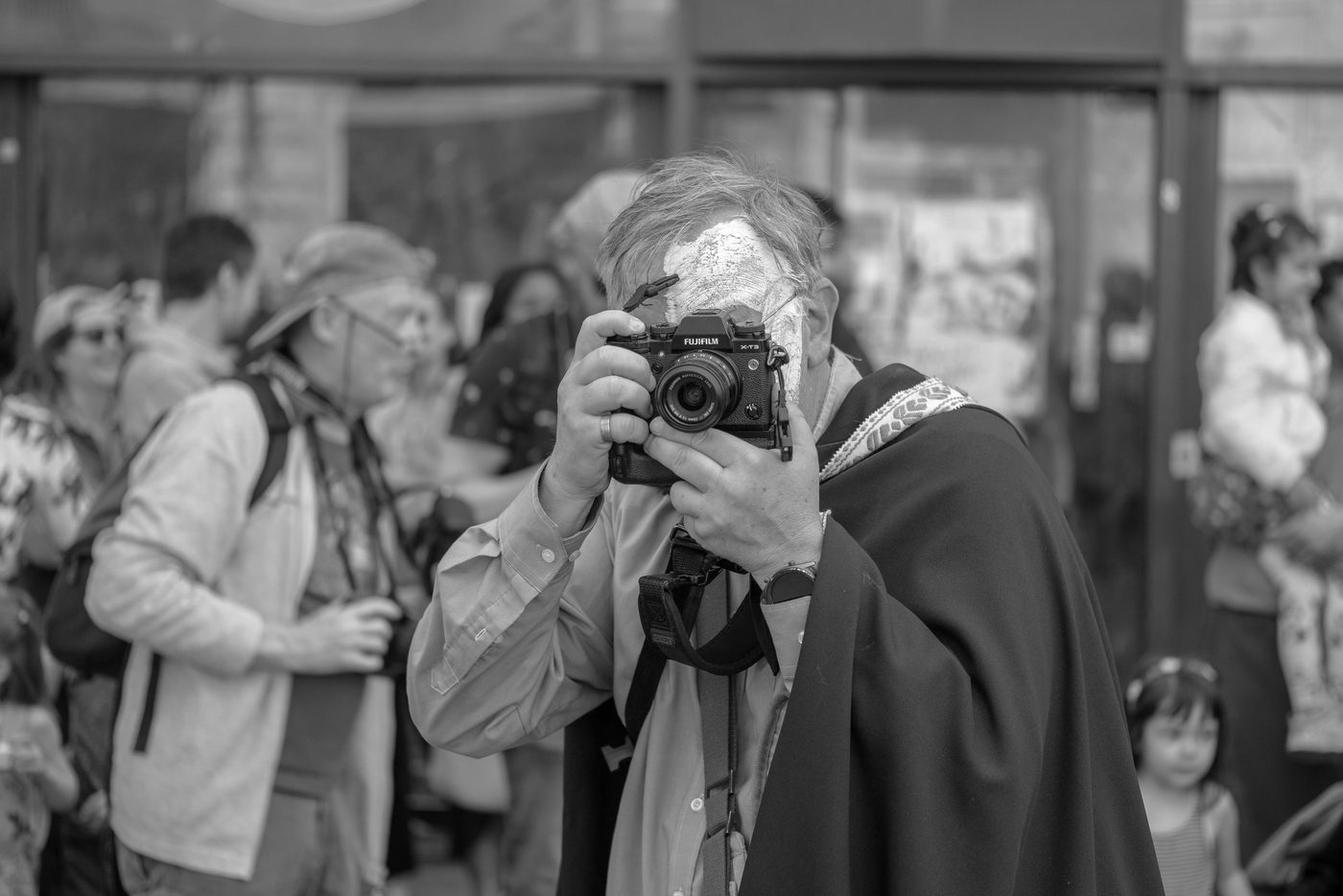 Photographe en action a la Zinneke Parade, Bruxelles (planche 084)